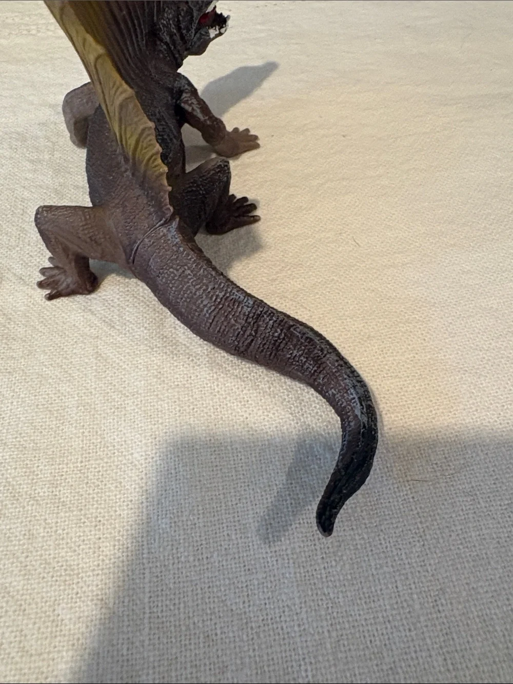 Source Unknown dinosaur brown
